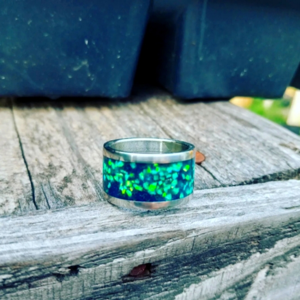Beautiful bright sea foam green set in crushed vibrant blue opal.